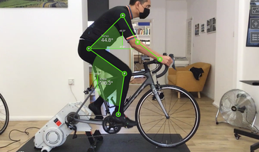 Cyclist pedalling during a bike fitting session